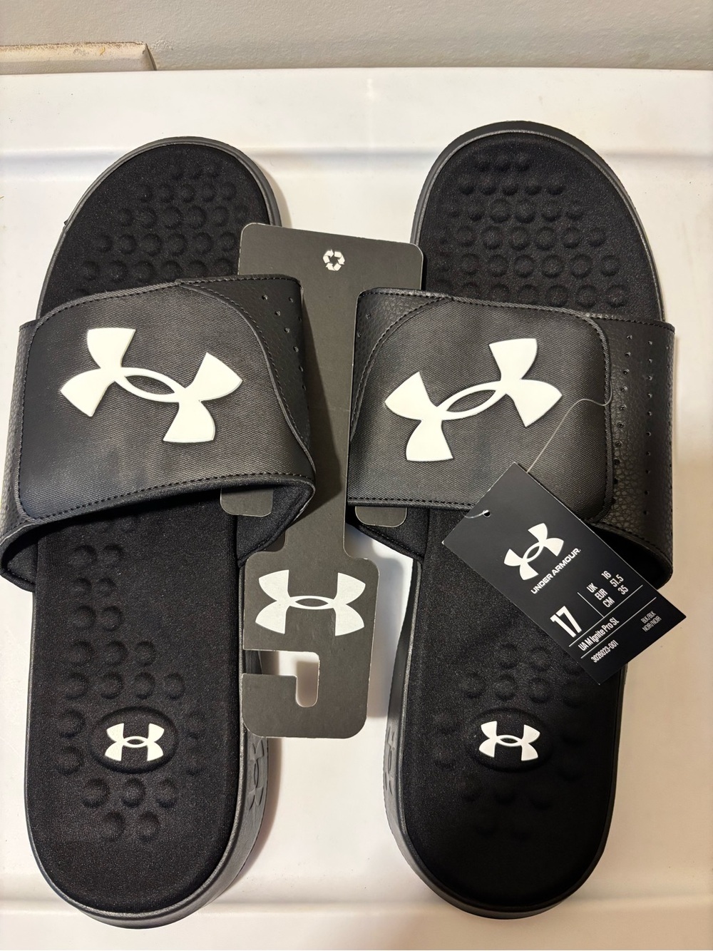 Under Armour Black Slide Sandals with White Logos